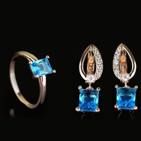 Позолоченный комплект Fallon 81200167-тёмно-голубые фианиты фото | Brulik