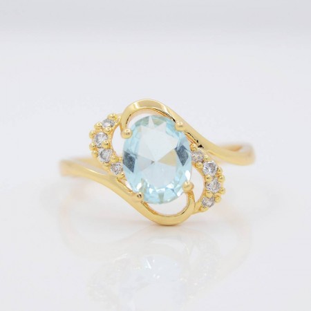 Чарующее позолоченное кольцо с фианитами 18К 10-1071-светло-голубой фото | Brulik