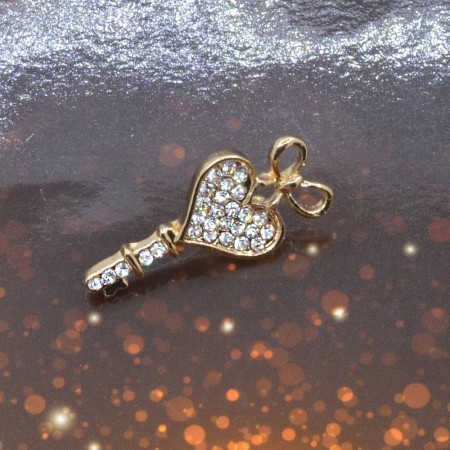 Восхитительная брошь Ключик с фианитами KH 197-12 фото | Brulik